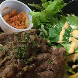 Beef bulgogi bowl. Rice underneath the generous helping of meat