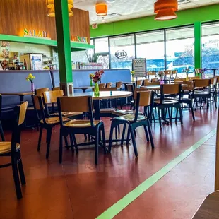 a restaurant with tables and chairs