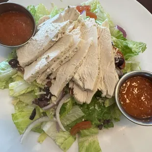 Large salad, enough for two meals, a large portion of real chicken.