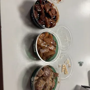 Fresh poke Ahi limu with unagi sauce Salmon poke Ahi dynamite