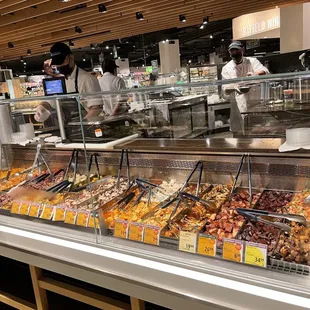 This display case only hold HALF of Foodland Farms&apos; poke varieties