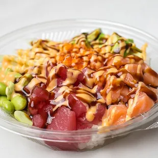 a bowl of food with a variety of toppings