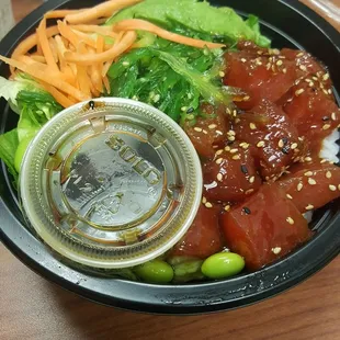 9.99....Tuna poke bowl with avocado, edamame, seaweed salad, carrots and sushi rice.