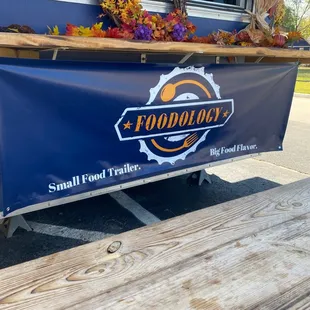 a table with a sign on it