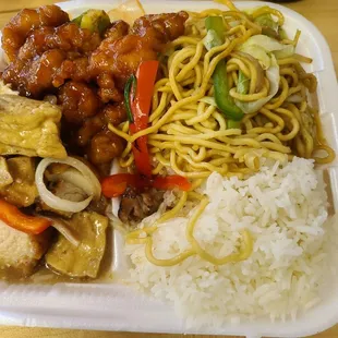 Down left is tofu with pork in its sauce, up left is orange chicken, up right is chow mein, below that is white rice.