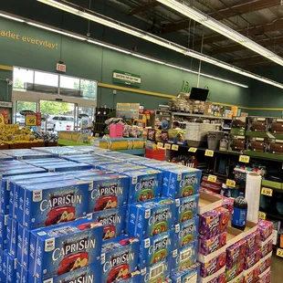 boxes of fruit and vegetables in a grocery store