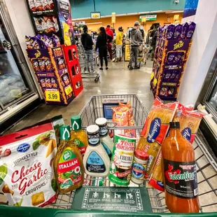 a shopping cart filled with groceries