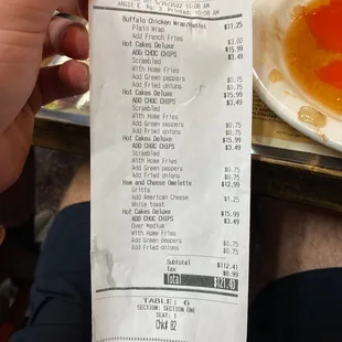 a person holding a receipt