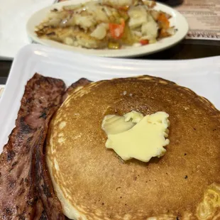 Stack of hot cakes with turkey bacon