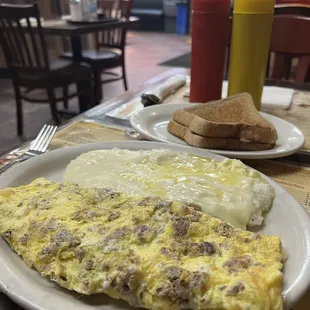 Cheesesteak omelette with grits