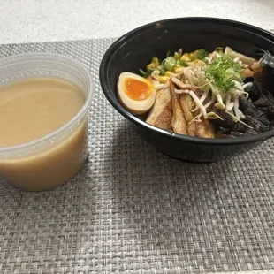 Chicken ramen, broth comes hot and steamy'