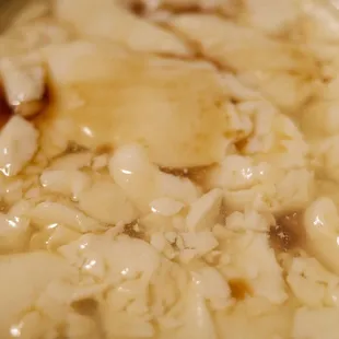 Freshly made tofu w/ ginger syrup
