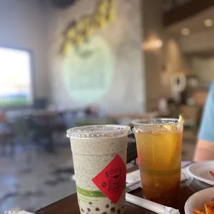 Left to right: black sesame frappe with amber boba, PAO iced tea