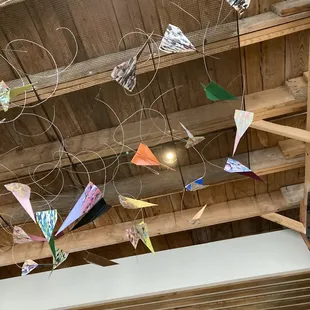 Paper airplane metal sculpture.