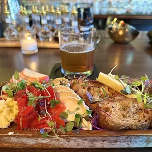 Up close charcuterie and an Angels Envy Gold Rush cocktail