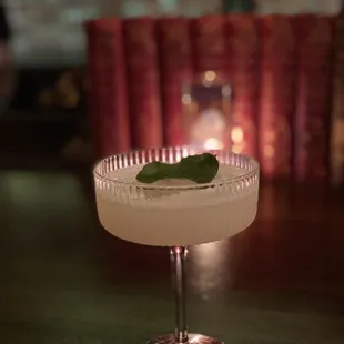 a cocktail in a glass on a table