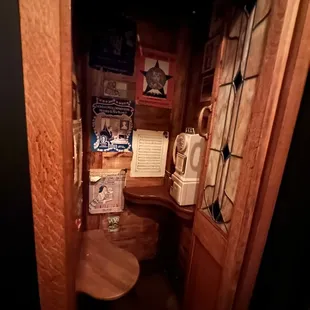 Phone booth by the restroom