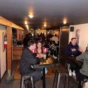 a group of people sitting at a table