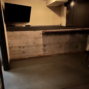 Standing section with a tv
