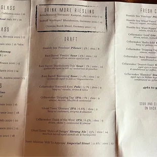 Menu of drinks: wine, draft beers, cans