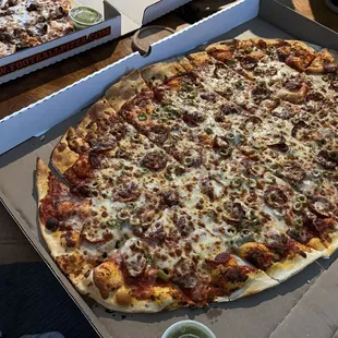 Pepperoni and green olive pizza