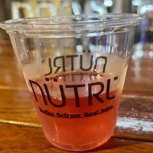 a drink in a plastic cup
