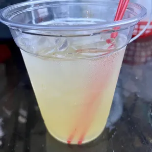 a drink in a plastic cup