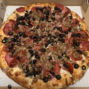 All meat minus salami and added olives.  Best pizza in area!