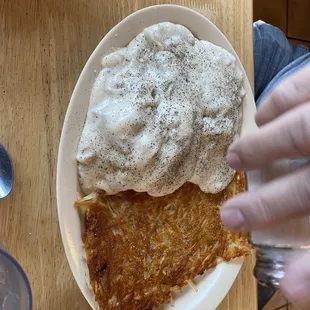 1 biscuit with gravy and hash browns
