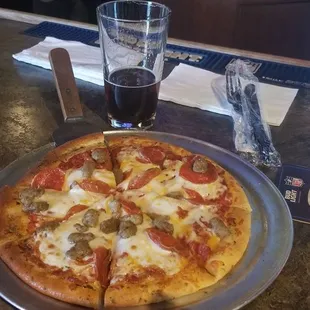 $10 pizza. Just the right size to fill up one person.