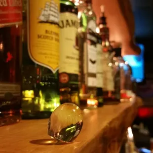 a glass on a bar counter