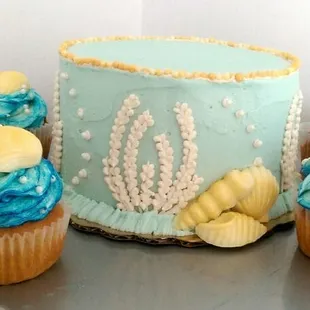 Wedding cut cake and cupcakes