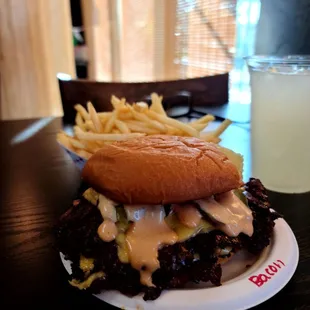 Smash double cheese burger with bacon. Side of fries and lemonade.