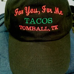 a baseball cap with tacos on it