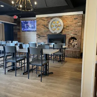 a dining room with tables and chairs
