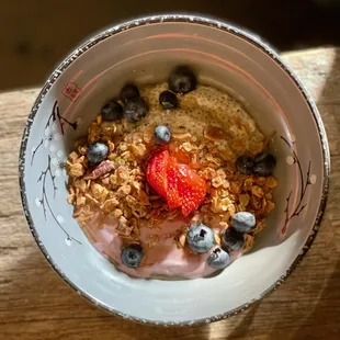 Start your day with the Super Food Bowl, made with acai berry greek yogurt, coconut cream chia pudding, house-made granola, fresh fruit