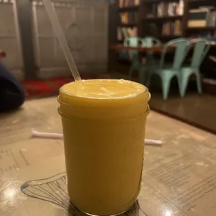 a smoothie with a straw in it
