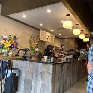 a man standing at the counter