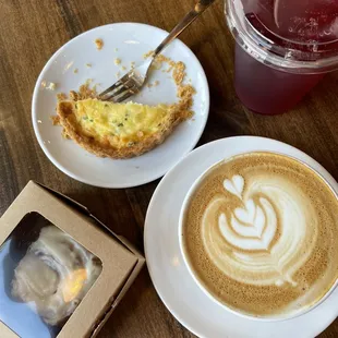 Latte, iced tea, quiche and cinnamon roll