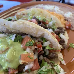 wo tacos on a plate