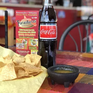  bottle of coke and chips