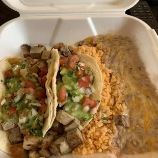 16. Two Carnitas Tacos Combo Plate delicious!