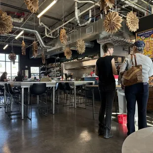 A birds eye view of Forbes Meat Company restaurant and open kitchen.