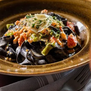 a close up of a plate of pasta