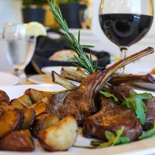 lamb chop served with roasted potatoes