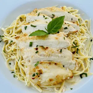 Linguine Alfredo with grilled chicken breast.