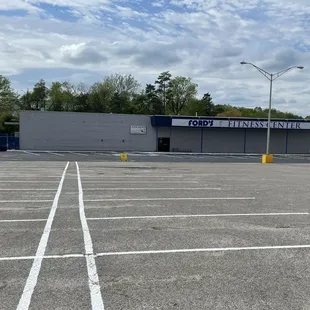 Fresh facelift- new marquee and improved parking lot, plus pickleball court behind the wooden fence