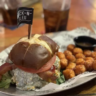 Black and blue burger with SWEET POTATO TOTS