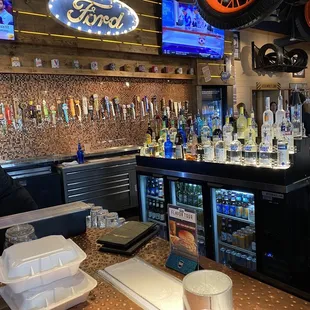 Check out the beer on tap and the penny wall behind it! Nice!