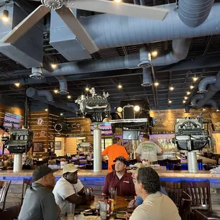 customers sitting at the bar